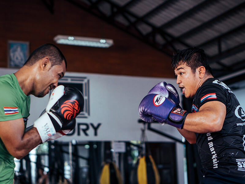 Two boxers in full sparring