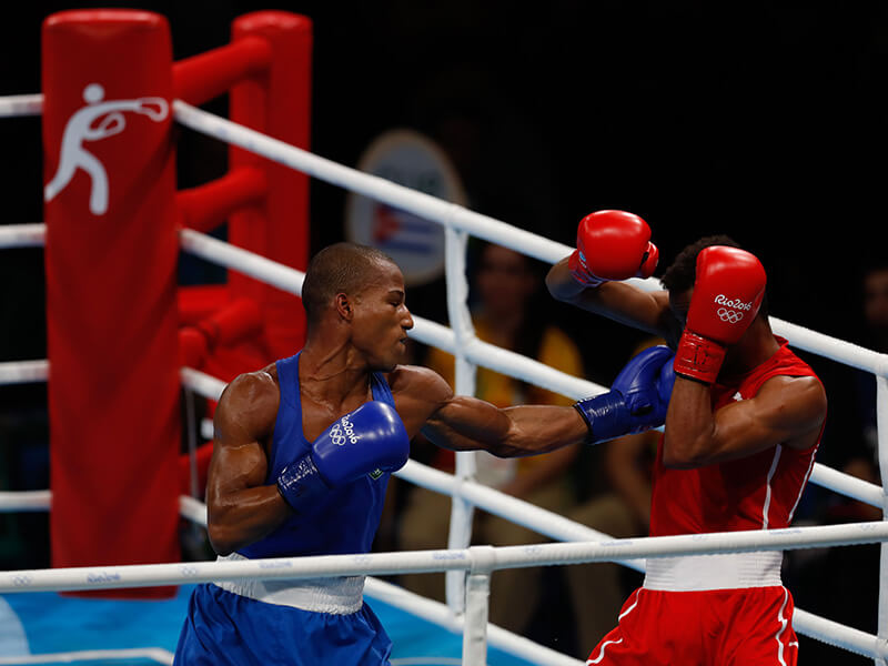 Two amateur boxers in full fight during the Rio Olympics in 2016