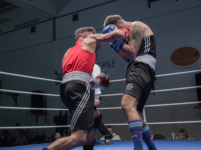 Two boxers in amateur fight